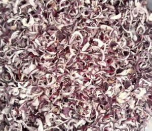 Premium Dehydrated Red Onion Flakes manufacturer, exporter and supplier from India by Flouers Agri Pvt Ltd