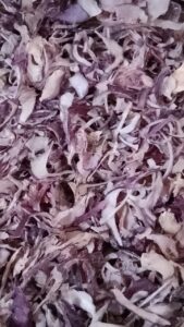 Premium Dehydrated Red Onion Flakes manufacturer, exporter and supplier from India by Flouers Agri Pvt Ltd