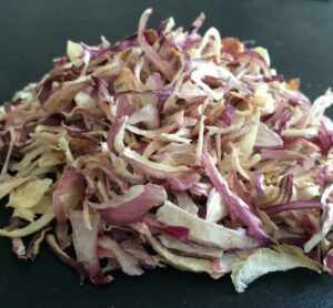 Premium Dehydrated Pink Onion Flakes manufacturer, exporter and supplier from India by Flouers Agri Pvt Ltd